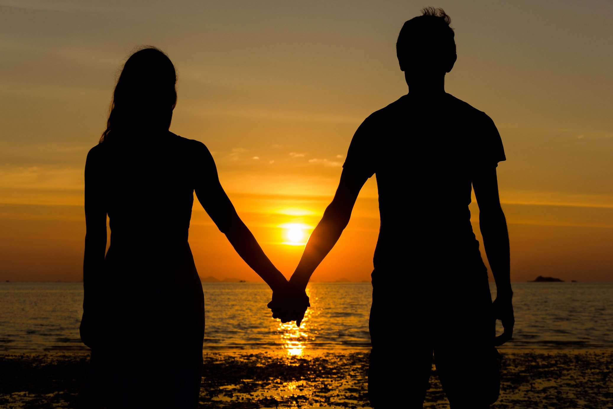 Sunset couple silhouette